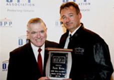 Frank accepting his award