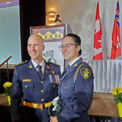 Burlington OPP Provincial Constable Noel Middleton with OPP Commissioner Thomas Carrique Ontario Women in Law Enforcement Banquet June 9, 2022 in Mississauga, Ontario