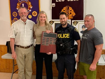 Provincial Constable Brandon Joyes getting the Eve McFadden award
