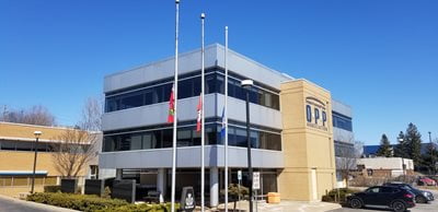 Flags lowered outside of the office for Jeff
