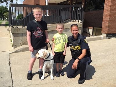 Jody Fedak with her sons and dog