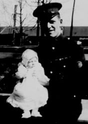 Norman Maker with his baby daughter