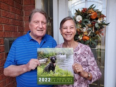 Mike and Jenny Catton with their calendar