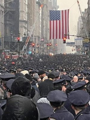 A mass of people attending Jason Rivera's funeral