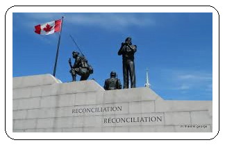 Peacekeeper statues with the Canadian flag in the background