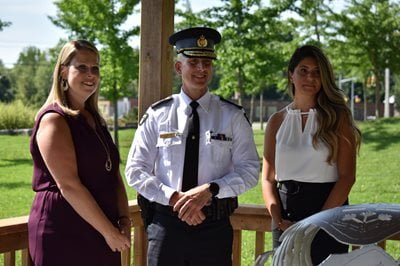 Commissioner and officer posing